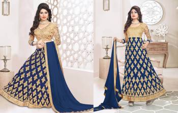 Look The Most Attractive Of All At The Next Function You Attend. So Grab This Dress Which Can Be Styled As Per Your Choice. It Can Be Made As Lehenga Choli Or An Anarkali Suit. It Comes With A Blouse And Semi Stitched Skirt Also With A Bottom And Dupatta. Its Blouse Is Fabricated On Art Silk Paired With Net Lehenga, Santoon Bottom And Chiffon Dupatta. 