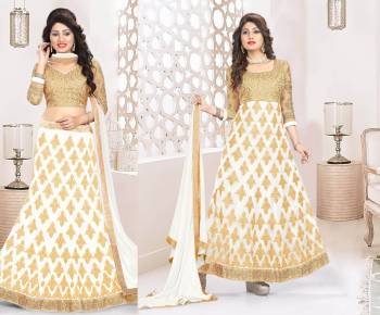 Flaunt Your Rich Taste Wearing This Beautiful Set Of Lehenga Choli Which Can Also Be Made As An Anarkali Suit As Per Your Choice. Its Blouse Is In Beige Color Paired With White Colored Lehenga And Dupatta And Also Beige Colored Bottom. Get This Stitched As Per Your Occasion And Comfort.