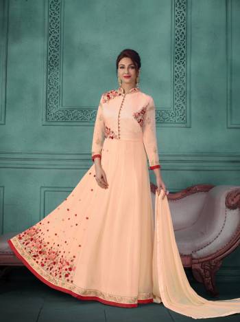 Most Demanding Color Of The Season Is Here With This Designer Floor Length Suit In Peach Color Paired With Peach Colored Bottom And Dupatta. Its Top Is Fabricated On Georgette Paired With Santoon Bottom And Chiffon Dupatta. Its All Three Fabrics Ensures Superb Comfort All Day Long. buy Now.