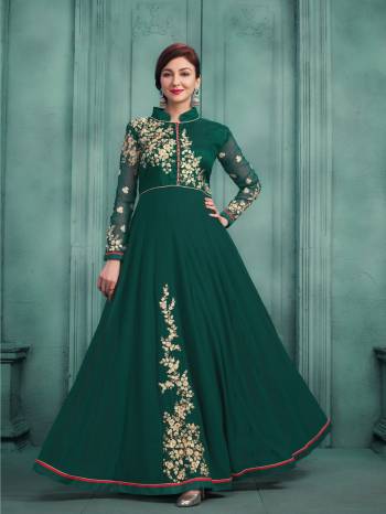 Catch All The Lime Light At The Next Function You Attend Wearing This Pine Green Colored Designer Floor Length Suit Paired With Pine Green Colored Bottom And Cream Colored Dupatta. Its Top Is Fabricated On Georgette Paired With Santoon Bottom And Chiffon Dupatta. Buy This Designer Suit Now.