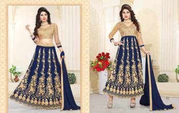 Look The Most Attractive Of All At The Next Function You Attend. So Grab This Dress Which Can Be Styled As Per Your Choice. It Can Be Made As Lehenga Choli Or An Anarkali Suit. It Comes With A Blouse And Semi Stitched Skirt Also With A Bottom And Dupatta. Its Blouse Is Fabricated On Art Silk Paired With Net Lehenga, Santoon Bottom And Chiffon Dupatta. 