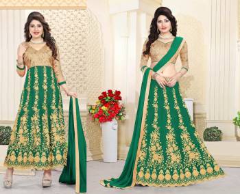 New And Unqiue Shade OF Green Is Here To Add Up Into Your Wardrobe With This Two n One Suit Which Can Be Made As Lehenga Choli Or Anarkali Suit. Its Blouse Is Fabricated On Art Silk Paired With Net Lehenga, Santoon Bottom And Chiffon Dupatta. All The Fabrics Ensures Superb Comfort All Day Long. 