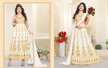 Flaunt Your Rich Taste Wearing This Beautiful Set Of Lehenga Choli Which Can Also Be Made As An Anarkali Suit As Per Your Choice. Its Blouse Is In Beige Coor Paired With White Colored Lehenga And Dupatta And Also Beige Colored Bottom. Get This Stitched As Per Your Occasion And Comfort.