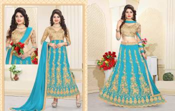 Attractive Color Is Here Which Make You Earn Lots Of Compliments From Onlookers. This Suit Has A Beige Colored Blouse And Bottom With Turquoise Blue Colored Lehenga And Dupatta. Get This Stitched As A Lehenga Choli Or An Anarkali Suit. Its Blouse Is Fabricated On Art Silk Paired With Net Fabricated Lehenga, Santoon Bottom And Chiffon Dupatta. 