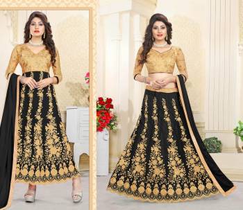 Look The Most Attractive Of All At The Next Function You Attend. So Grab This Dress Which Can Be Styled As Per Your Choice. It Can Be Made As Lehenga Choli Or An Anarkali Suit. It Comes With A Blouse And Semi Stitched Skirt Also With A Bottom And Dupatta. Its Blouse Is Fabricated On Art Silk Paired With Net Lehenga, Santoon Bottom And Chiffon Dupatta. 