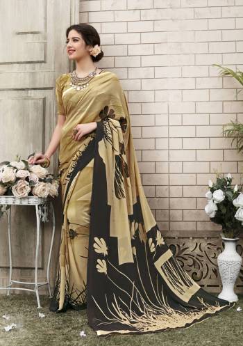 Simple And Elegant Looking Saree Is Here With This Beige Colored Saree Paired With Beige Colored Blouse, This Saree And Blouse Are Fabricated On Georgette With Abstract And Floral Prints.