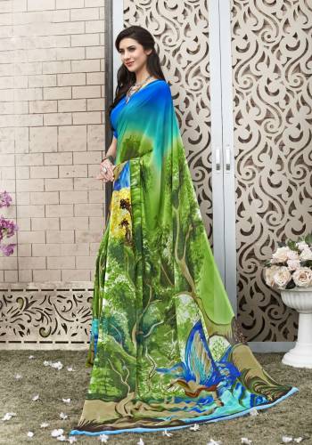 Cool Colored Pallete Saree Is Here With This Green And Blue Colored Saree Paired With Blue Colored Blouse. This Saree And Blouse Are Fabricated On Georgette Beautified With Prints Over Its Long Pallu.