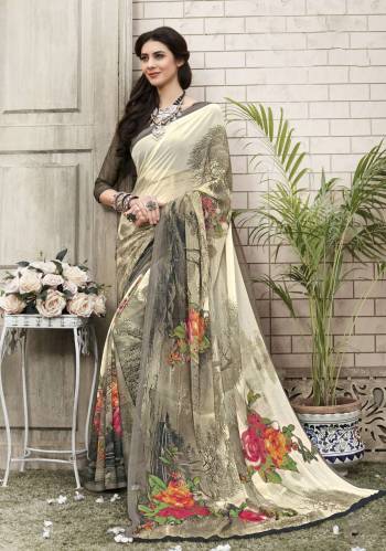 You Will Definitely Earn Lots Of Compliments Wearing This Saree In Off-White And Grey Color Paired With Grey Colored Blouse. This Saree Is Beautified With Multi Colored Floral Prints. Buy Now.