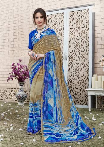 Grab This Simple Saree For Your Casual Wear In Beige and Blue Color Paired With Blue Colored Blouse. This Saree And Blouse Are Fabricated On Georgette , It Is Light Weight And Soft Towards Skin. Buy Now.