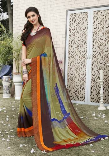 New And Unique Prints Are Here With This Saree In Multi Color Paired With Bright Orange Colored Blouse. This Saree And Blouse Are Fabricated On Georgette Beautified with Unique Prints All Over It. 