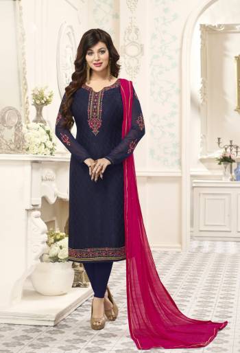 For An Attractive Personality, Grab This Designer Straight Cut Suit In Navy Blue Color Paired With Navy Blue Colored Bottom And Contrasting Dark Pink Colored Dupatta. Its Top Is Fabricated On Brasso Georgette Paired With Santoon Bottom And Chiffon Dupatta. Buy This Semi-Stitched Suit Now.