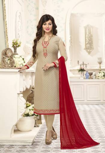 Simple And Elegant Looking Designer Staright Cut Suit Is Here In Beige Color Paired With Beige Colored Bottom And Contrasting Red Colored Dupatta. It Is Beautified With Jari And Thread Embroidery With Stone Work. Buy Now.