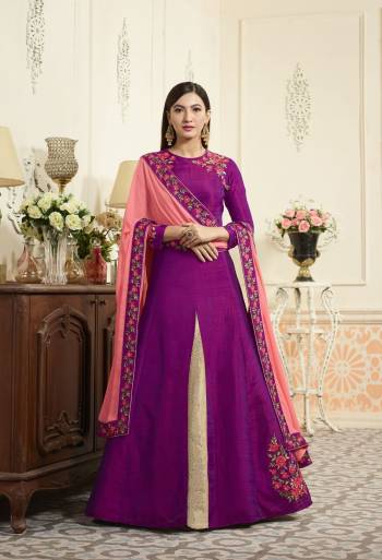 Shine Bright Wearing This Magenta Pink Colored Designer Floor Length Suit In Magenta Pink Color Paired With Beige Colored Bottom And Peach Colored Dupatta. Its Top Is Fabricated On Art Silk Paired With Santoon Bottom And Chiffon Dupatta. It Is Attractiv Embroidery Over The Top And Dupatta Lace Border. Buy Now.