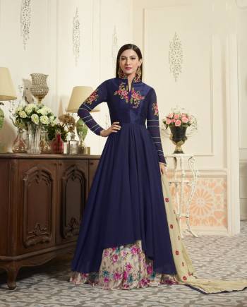 You Will Definitely Earn Lots Of Compliments Wearing This Designer Indo Western Dress In Navy Blue Colored Top Paired With Multi Colored Lehenga And Beige Colored Dupatta. Its Top Is Fabricated On Georgette Paired With Santoon Bottom And Chiffon Dupatta. It Is Beautified with Prints And Thread Work.