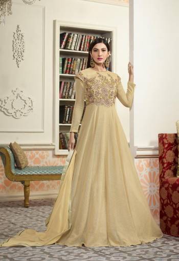 Simple and Elegant Looking Designer Floor Length Suit Is Here In  Beige Colored Top Paired With Beige Colored Bottom And Dupatta. Its Top Is Fabricated On Fancy Net Paired With Santoon bottom And Chiffon Dupatta. Buy This Suit Now.