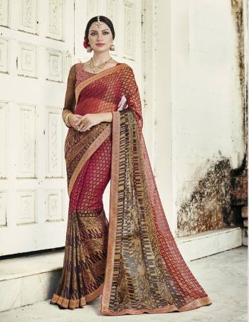 This Festive Season Be The Most Gorgeous One Wearing This Saree In Red And Brown Color Paired With Red And Brown Colored Blouse. This Saree And Blouse Are Fabricated On Chiffon Brasso Beautified With Prints All Over. Buy Now.