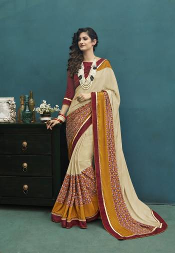 Flaunt Your Rich And Elegant Taste Wearing this Saree In Rich Cream Color Paired With Maroon Colored Blouse. This Saree And Blouse Are Fabricated On Art Silk Beautified With Prints. This Saree Is Light Weight And Easy To Drape Which Is Easy To Care For. Buy This Pretty Saree Now.