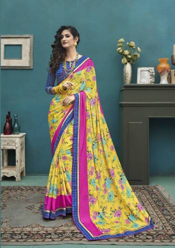 Catch All The Limelight Wearing This Attractive Saree In Yellow Color Paired With Contrasting Royal Blue Colored Blouse. This Saree And Blouse Are fabricated On Art Silk Beautified With Multi Colored Floral Prints All Over It.