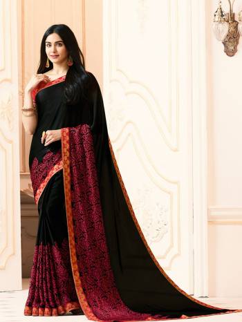 Enhance Your Beauty Wearing This Saree In Black Color Paired With Red Colored Blouse. This Saree Is Fabricated On Georgette Paired With Art Silk Fabricated Blouse. It Has Prints And Lace Border Making The Saree More Attractive.