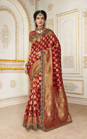 Adorn The Angelic Look Wearing This Saree In Red Color Paired With Red Colored Blouse. This Saree And Blouse Are Fabricated On Jacquard Silk Beautified With Weave And Embroidered Lace Border. Buy This Saree Now.