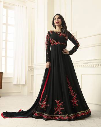 Enhance Your Beauty Wearing This Designer Floor Length Suit In Black Color Paired With Black Colored Bottom And Dupatta. Its Top Is Fabricated On Georgette Paired With Santoon Bottom And Chiffon Dupatta. It Has Contrasting Embroidery Over The Top. Buy This Suit Now.