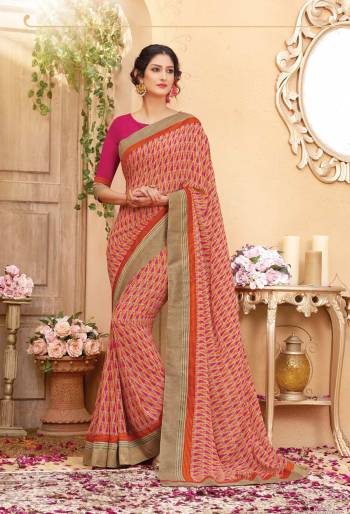 Colors Add Beauty To Any Attire, So Grab This Saree In Pink And Orange Color Paired With Dark Pink Colored Blouse. This Saree And Blouse are Fabricated On Georgette Beautified With Small Prints All Over It.