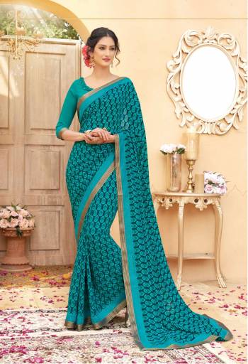 Look Simply Pretty In This Blue Colored Saree Paired With Blue Colored Blouse. This Saree And Blouse are Fabricated On Georgette Beautified With Prints. It Is Light Weight And easy To Carry All Day Long. 