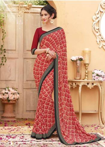 Simple And Elegant Looking Saree Is Here In Red And Cream Color Paired Wih Maroon Colored Bloue. This Saree And Blouse Are Fabricated On Georgette Beautified With Prints. It Is Light Weight And Easy To Drape Which Is Easy To Carry All Day Long.