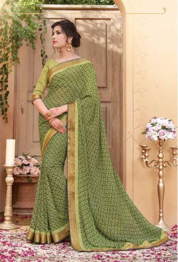 Here Is A Saree For Your Casual Or Semi-Casual Wear, So Grab This Pretty Saree In Light Green Color Paired With Light Green Colored Blouse. This Saree And Blouse Are Fabricated On Georgette Beautified With Basic Prints All Over. Buy Now.