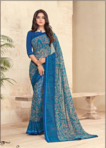 Look Simply Pretty In This Blue Colored Saree Paired With Blue Colored Blouse. This Saree And Blouse are Fabricated On Georgette Beautified With Prints. It Is Light Weight And easy To Carry All Day Long.