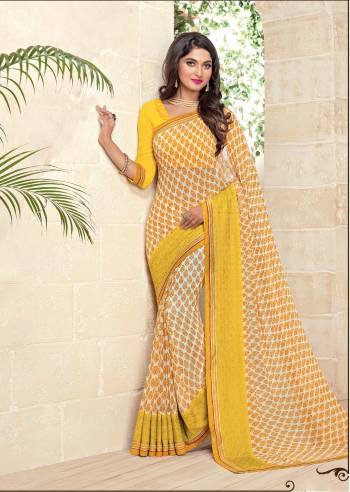 Add This Pretty Saree With Pretty Unique Color In Yellow Colored Saree Paired With Yellow Colored Blouse. This Saree And Blouse Are Fabricated On Georgette Beautified With Simple Prints And Lace Border. Buy It Now.