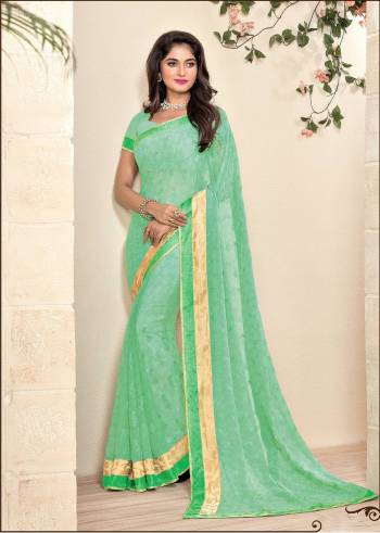 Add This Pretty Shade Of Green With This Saree In Sea Green Color Paired With Sea Green Colored Blouse. This Saree And Blouse Are Fabricated On Georgette, It Is Light Weight And Easy To Carry All Day Long.