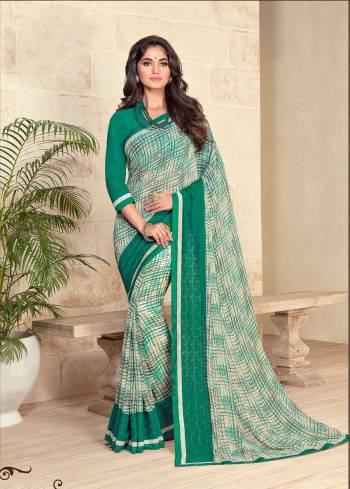 Unique Checks Printed Saree Is Here In Green And White Color Paired With Green Colored Blouse. This Saree And Blouse are Fabricated On Georgette, It Is Light Weight and Soft Towards Skin Which Is Easy To Carry All Day Long. Buy Now.