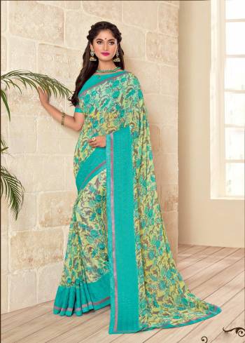 Look Simply Pretty In This Blue Colored Saree Paired With Turquoise Blue Colored Blouse. This Saree And Blouse are Fabricated On Georgette Beautified With Prints. It Is Light Weight And easy To Carry All Day Long.