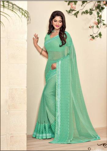 Add This Pretty Shade Of Green With This Saree In Sea Green Color Paired With Sea Green Colored Blouse. This Saree And Blouse Are Fabricated On Georgette, It Is Light Weight And Easy To Carry All Day Long.