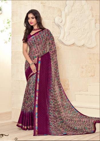 Go Colorful Wearing This Saree In Multi Color Paired With Wine Colored Blouse, This Saree And Blouse are fabricated On Georgette Beautified With Prints All Over It. Buy This Saree Now.