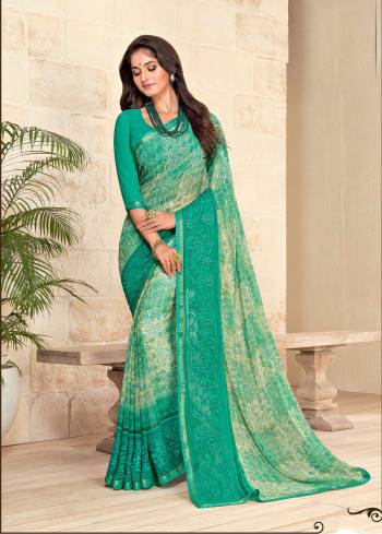 Add This Pretty Shade Of Green With This Saree In Sea Green Color Paired With Sea Green Colored Blouse. This Saree And Blouse Are Fabricated On Georgette, It Is Light Weight And Easy To Carry All Day Long.