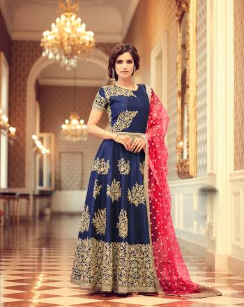 Get Ready For The Next Wedding At Your Place With This Heavy Designer Floor Length Suit In Navy Blue Colored Top Paired With Navy Blue Colored Bottom And Contrasting Dark Pink Colored Dupatta. Its Top Is Fabricated On Art Silk Paired With Santoon Bottom And Net Dupatta. It Is Beautified with HEavy Jari Embroidery With Sequence Work. Buy It Now.