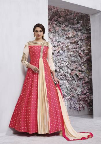 New And Unique Patterned Designer Floor Length Suit Is Here In Pink Colored Top Paired With Cream Colored Bottom And Dupatta. This Readymade Suit Has Unique Front Pattern Which, Its Top Is Fabricated On Jacquard Silk Paired Wirh Santoon Bottom And Chiffon Dupatta. 