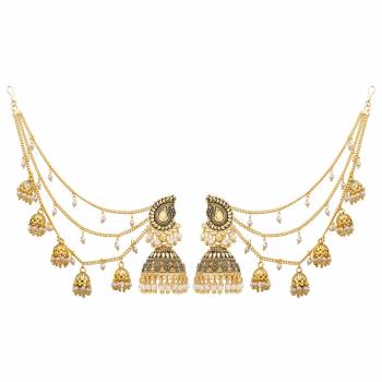 Another Pretty Attractive Earrings Set Is Here Which Can Be Paired With Heavy Traditonal Attire Like Lehenga Or Saree. As It Is In Golden Color Can Be Paired With Any Colored Attire. Buy Now.