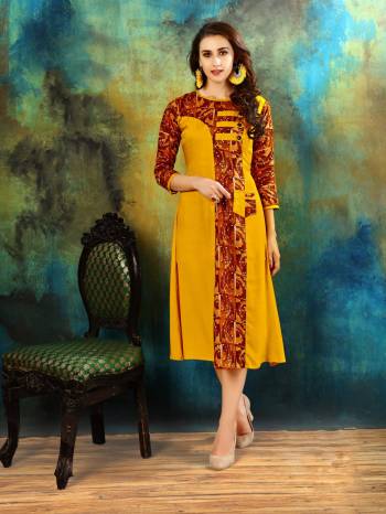 For Your Semi-Casual Wear, Grab This Pretty Readymade Kurti In Yellow Color Fabricated On Rayon Cotton Beautified With Prints. It Is Available In Many Sizes. Buy This Kurti Now.