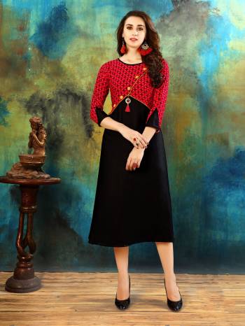 Enhance Your Beauty In This Lovely Patterned Readymade Kurti In Black And Red Color Fabricated On Rayon Cotton. This Kurti Is Ligt Weight And Easy To Carry All Day Long. Buy Now.