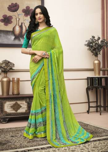 For Your Regular Wear, Grab This Pretty Saree In Green Color Paired With Contrasting Turquoise Blue Colored Blouse. This Saree Is Fabricated On Georgette Paired With Cotton Fabricated Blouse. Both Its Fabrics Are Light Weight And Easy To Carry All day Long.