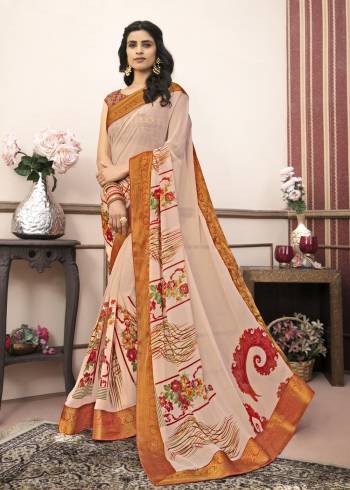 You Will Definitely Earn Lots Of Compliments Wearing This Saree In Peach Color Paired With Multi Colored Blouse. This Saree Is Fabricated On Georgette Paired With Cotton Fabricated Blouse. This Pretty Saree Is Light Weight And Easy To Carry All Day.