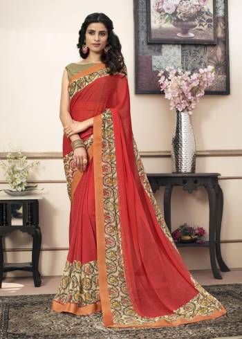 Adorn The Pretty Angelic Look Wearing This Saree In Red Color Paired With Beige Colored Blouse. This Saree Is Fabricated On Georgette Paired With Cotton Fabricated Blouse. This Saree Has Printed Lace Border Which Is Making The Saree Attractive.