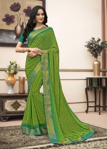 For Your Regular Wear, Grab This Pretty Saree In Green Color Paired With Contrasting Teal Green Colored Blouse. This Saree Is Fabricated On Georgette Paired With Cotton Fabricated Blouse. Both Its Fabrics Are Light Weight And Easy To Carry All day Long.