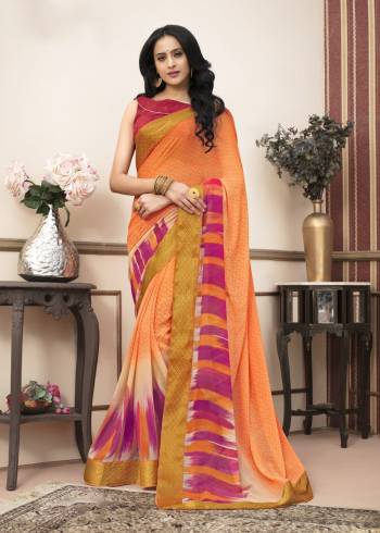 Beat The Heat With Bright Summery Colors With This Casual Saree In Orange Color Paired With Contrasting Dark Pink Colored Blouse. This Saree Is Fabricated On Georgette Paired With Cotton Fabricated Blouse. It Is Very Simple Prints Over Saree.