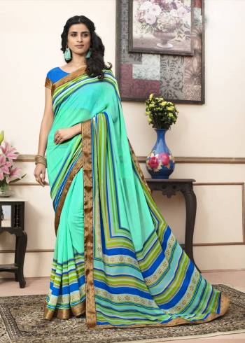 For Your Regular Wear, Grab This Pretty Saree In Sea Green Color Paired With Contrasting Blue Colored Blouse. This Saree Is Fabricated On Georgette Paired With Cotton Fabricated Blouse. Both Its Fabrics Are Light Weight And Easy To Carry All day Long.