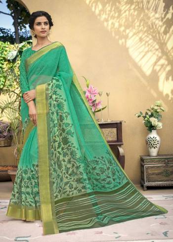 Grab This Pretty Saree In Green Color Paired With Green Colored Blouse. This Saree Is Fabricated On Chanderi Art Silk Paired With Lycra Fabricated Blouse. Both Its Fabrics Are Durable And Easy To care For.