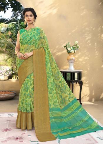 Grab This Pretty Saree In Green Color Paired With Green Colored Blouse. This Saree Is Fabricated On Chanderi Art Silk Paired With Lycra Fabricated Blouse. Both Its Fabrics Are Durable And Easy To care For.